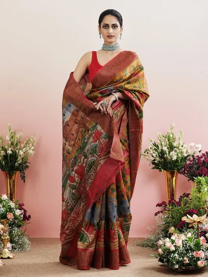 A beautiful saree with a detailed print depicting scenes from Indian mythology and courtly life.