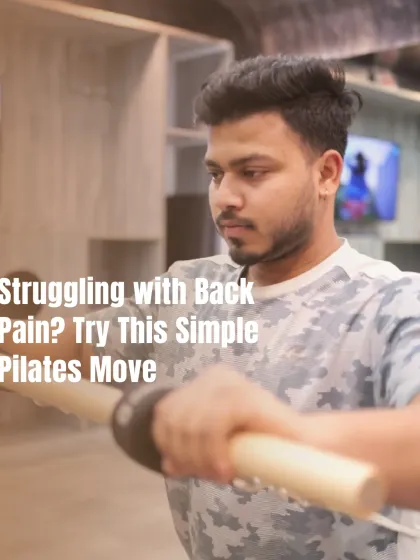 Back pain often stems from a weak core. I design specific Pilates exercises, like this one using the roll-down bar, to strengthen the muscles that support your spine and alleviate discomfort.