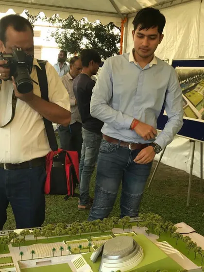Here I am presenting the architectural model of the museum. This model was a key tool in communicating the design vision for this winning global competition entry.