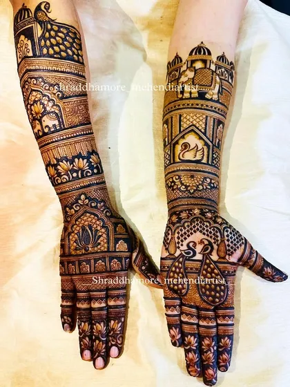 A royal-themed design with elephants, swans, and peacocks. The intricate patterns and clean lines make this a timeless choice for any bride.
