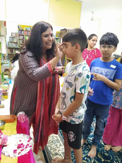 A smile of blessing for one of our young participants. It's important to me that every child feels seen, welcomed, and included in our festive celebrations.