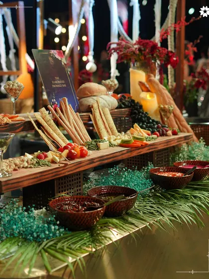 Our elaborate Fromage Bar at a destination wedding in Bengaluru. We bring gourmet experiences like artisanal cheese and bread bars to any location, ensuring a sophisticated touch.
