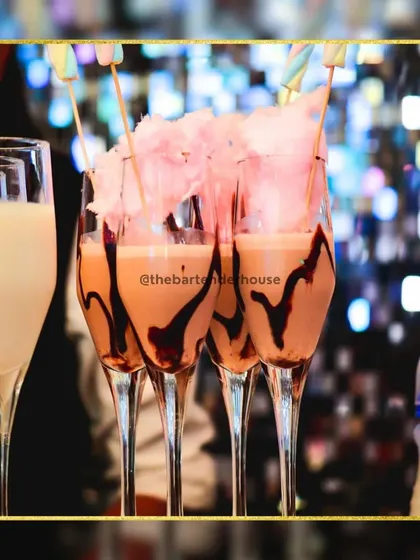 A truly decadent creation. This is our signature chocolate shake, drizzled with chocolate syrup and topped with a cloud of pink cotton candy.