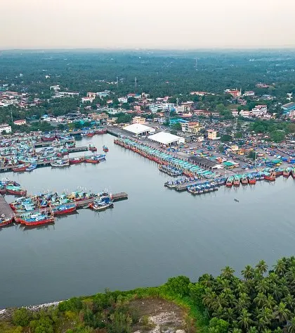 A duplicate of image 11, another aerial view of the busy Malpe fishing harbour.
