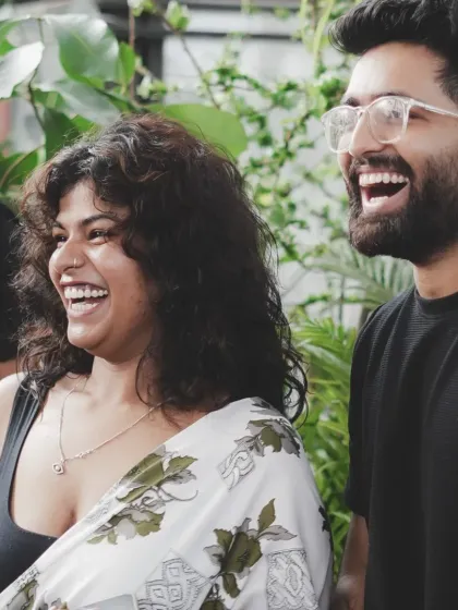 A candid moment of laughter between our vocalist and a team member. The fun we have on stage is genuine.