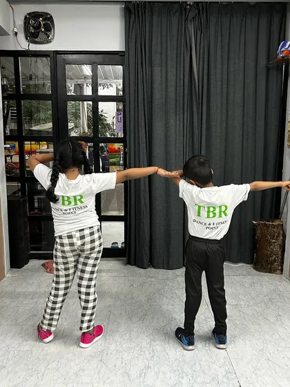 The back of our studio t-shirts, showing the unity of our little dancers. They are proud to be part of The Beat Room crew.
