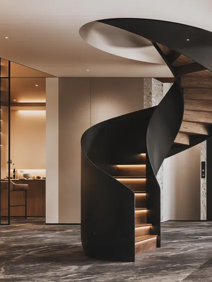 A stunning sculptural spiral staircase is the hero of this render. I focused on the smooth curves of the black metal and the warm glow of the illuminated wooden steps.
