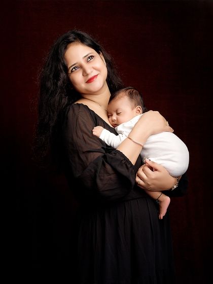 A mother's love and dreams for her child, all captured in one gentle portrait. These are the quiet, beautiful memories we create.