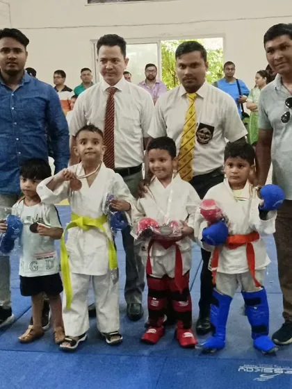 A group of our youngest champions with their medals and gear after a competition. They are the future of Indian martial arts.