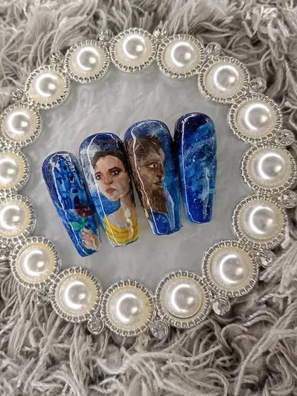 A top-down view of this magical Disney-themed nail set.