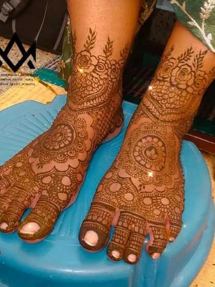Your bridal look is complete with beautiful mehendi on your feet. I design patterns that complement your hand mehendi, like this traditional mandala and toe design.