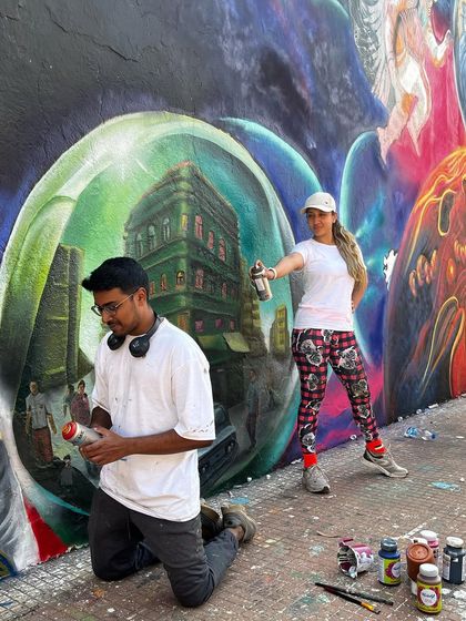My partner in crime and I, spray-painting a section of the IIT Bombay mural. Collaboration is a beautiful part of the creative process.