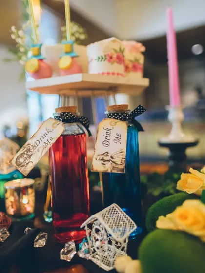 It's the little details that make an event magical. These "Drink Me" potions were a playful and iconic touch for our Alice in Wonderland themed party, adding to the immersive and fantastical experience for guests.