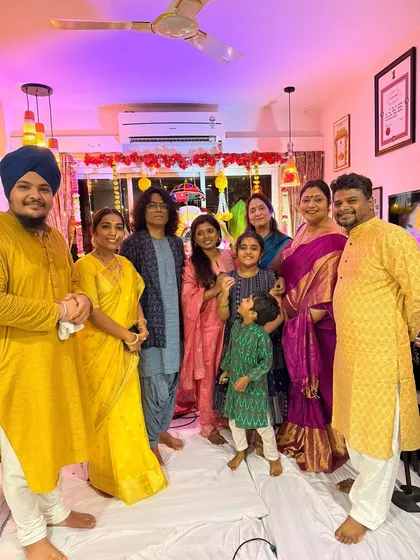 A group photo from the Ganpati celebrations at Sivamani sir's home. The musical family is a warm and supportive community.