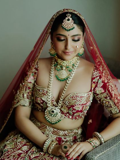 A portrait of bridal perfection. The deep kohl, soft blush, and perfectly defined lips come together to create a look that is both powerful and graceful.