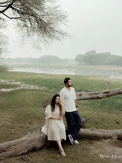 A serene portrait of Kushal and Hemal in a natural setting. This shot captures a moment of peace and togetherness, reflecting their journey from schoolmates to soulmates.