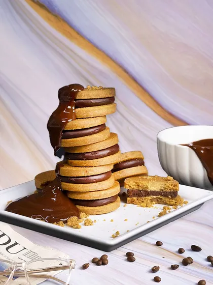 Celebrating Chocolate Macaroon Day with these indulgent chocolate-filled sandwich cookies. A richer, denser cousin to the macaron, these are pure chocolate bliss.