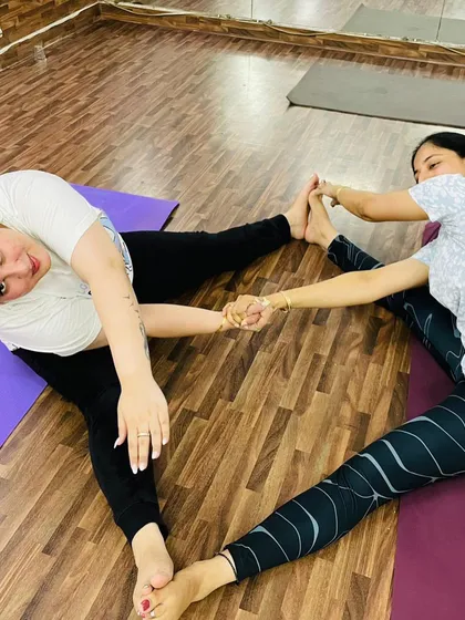 Another view of our partner stretches. Working with a partner allows you to use gentle resistance to increase your range of motion safely.