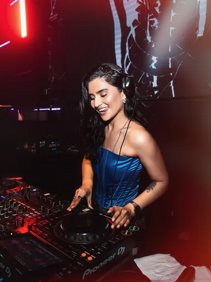 Caught in my element. This is me in the zone, mixing tracks and feeling the energy of the crowd at a recent gig in Hyderabad. I focus on every beat to make sure the dancefloor is always moving.