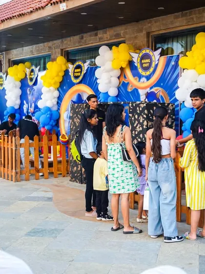 Guests lining up to enjoy the various Sonic-themed games and activities at this outdoor party.