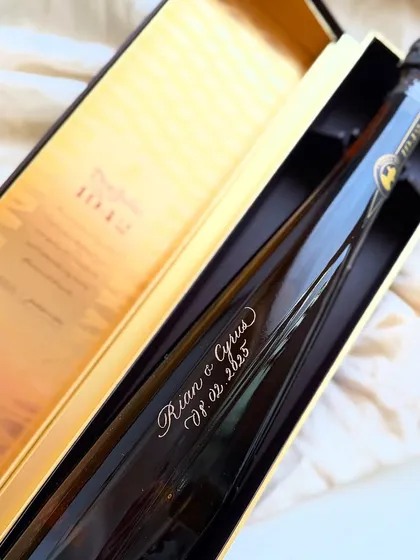 The iconic Don Julio 1942 bottle is an engraver's dream. This clean, elegant engraving for a wedding gift showcases how a personal touch can elevate a luxury product, making it a timeless and deeply meaningful present.