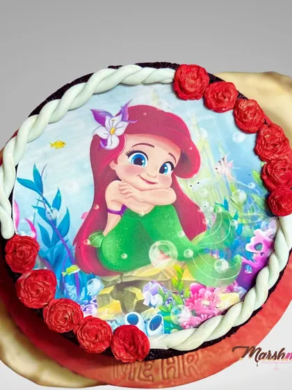 Hello Mermaid! This simple but glamorous chocolate tea cake was decorated with an edible print of Ariel, The Little Mermaid, for a school event. Even a simple cake can be special!
