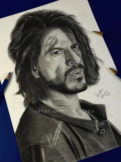 A pencil sketch of Shah Rukh Khan as Pathaan. In my portrait drawing lessons, we work on capturing textures like hair and fabric to add more realism.