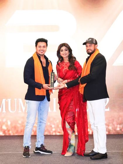 Receiving the award on stage. It is an honor to be recognized for our hard work, perseverance, and love for what we do.