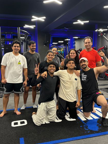 Sweat, determination, and a whole lot of heart. This group shot captures the spirit of our tribe, stronger with every drop of sweat.