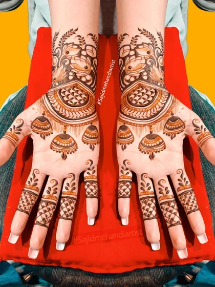I love creating unique motifs in my mehandi. This design features beautiful 'jhumka' (traditional earring) patterns, making it a creative and stylish choice for any party or function.
