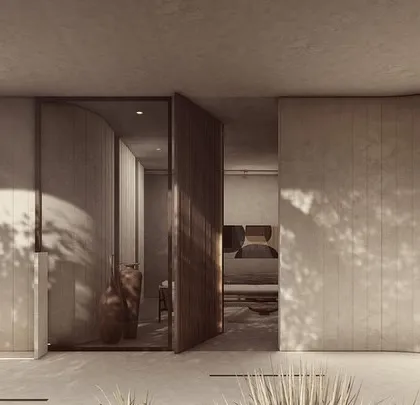 The kitchen in the Pavilions in the Fields project is designed as a central gathering point. A large island provides ample workspace and seating, while the open layout connects it to the dining area and views of the paddy fields.
