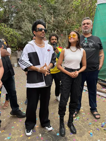 A candid shot of artists Tony Kakkar and Yohani backstage at the Holi event. My event coverage often includes capturing these behind-the-scenes moments.