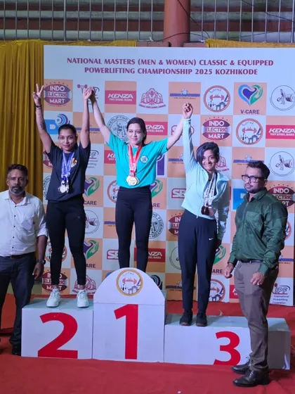 Results are the only metric that matters. Here is my client Renu on the podium, securing a bronze medal at her first National Powerlifting Meet after hitting personal bests on her squat and deadlift. This is the outcome of consistent, structured strength training.