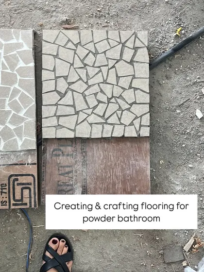 Crafting a custom mosaic floor for a powder bathroom. I believe in attention to detail, and sometimes that means creating something truly unique from scratch.