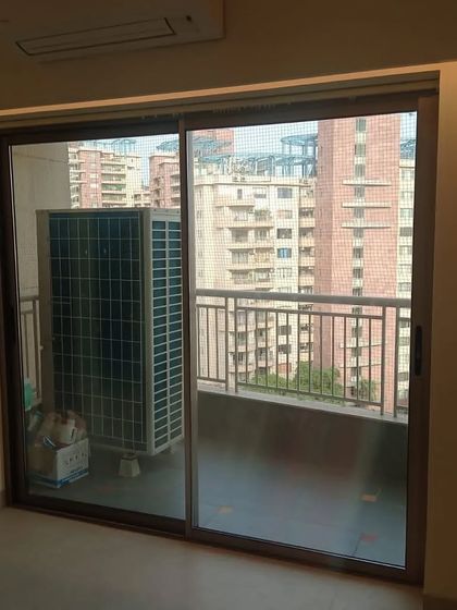 A two-panel sliding door by Eternia, perfect for a bedroom balcony.