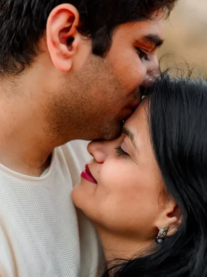 Sometimes the most powerful portraits are the quietest. This intimate, close-up moment during an outdoor session captures the gentle and soulful side of a relationship, focusing purely on the connection between two people.
