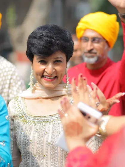 Enjoying a wedding celebration with a big smile. A healthy lifestyle makes you glow from the inside out.