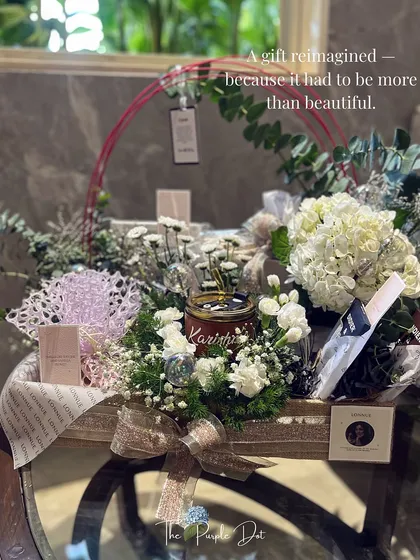 Some gifts must be more than beautiful; they must tell a story. This hamper for a brand launch was completely reimagined to honor the founder's journey, using hydrangeas, custom quotes, and layered textures to reflect the elegance of her new brand.