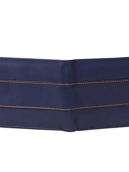 The back view of the navy blue leather wallet, showcasing the continuation of the clean lines and contrast stitching. The bifold design remains slim and easy to fit in a pocket.
