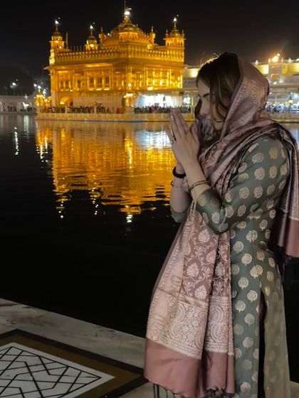 Seeking blessings at the Golden Temple in a beautiful traditional suit. This shows a more personal side of my ethnic styling, perfect for moments that are both spiritual and stylish.
