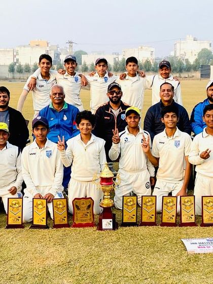 The victorious U-14 team with all their trophies. A great achievement for these kids.