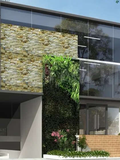 Celebrating the legacy of Dr. Puneeth Rajkumar. We are grateful to have designed this commercial space, with its green wall and stone cladding, to reflect his warmth and vision.