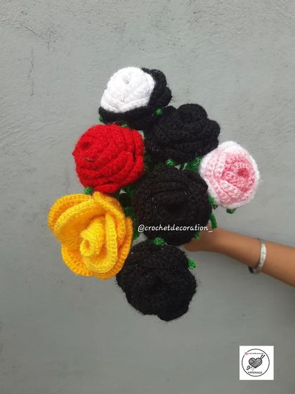 A selection of single rose stems in various colors: red, yellow, black, white, and pink. Mix them to create a colorful and personalized rose bouquet.