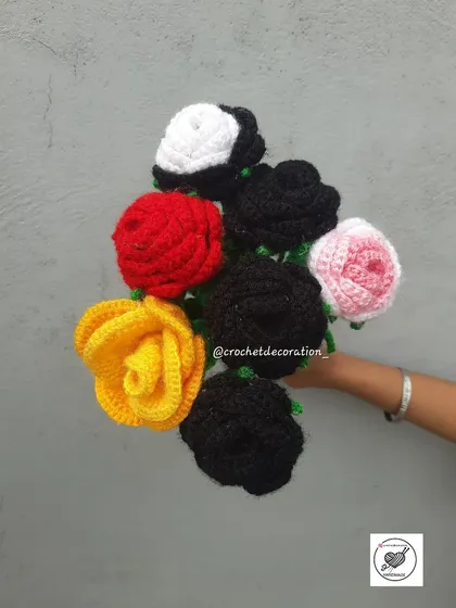 A selection of single rose stems in various colors: red, yellow, black, white, and pink. Mix them to create a colorful and personalized rose bouquet.