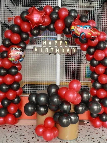 A full view of our "Cars" themed balloon arch, creating an exciting entrance for all the little racers attending the party.