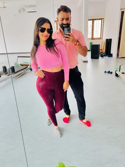 A stylish mirror selfie with a client. We build strength and confidence here.