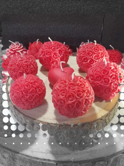 Scented whispers and rosy swirls. This collection of red rose ball candles is perfect for letting love glow in every flame.