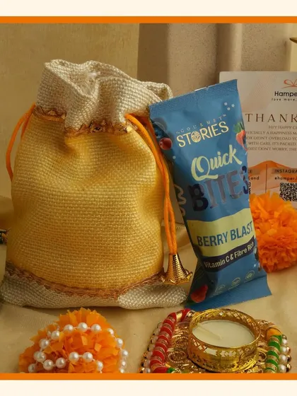 Brighten up your celebrations with our vibrant orange Navratri and Diwali hampers, filled with small treats and decorative diyas.