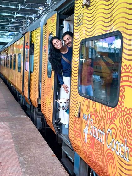 Traveling with my dog is one of my greatest joys. Here we are, my husband Ali, Pantu, and me, ready to start our journey from Mumbai to Delhi on the train.