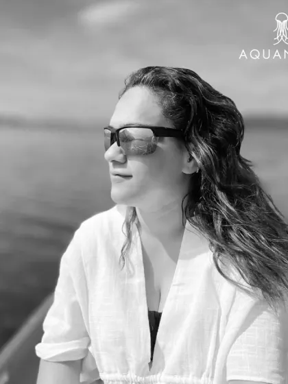 A portrait of one of our divers, radiating joy and confidence. The ocean has a way of bringing out the best in us.